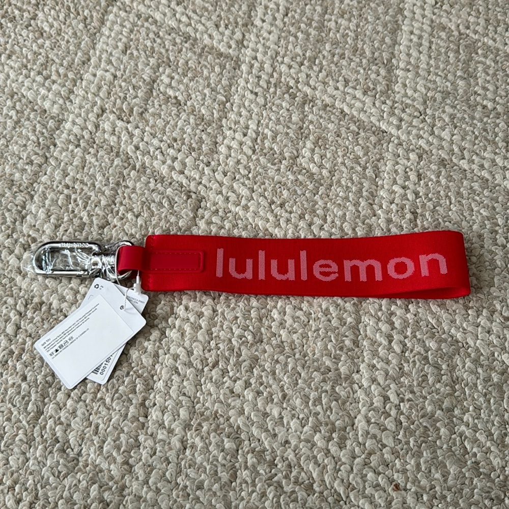 ⭐️ NWT: Red Lululemon Never Lost Keychain ⭐️